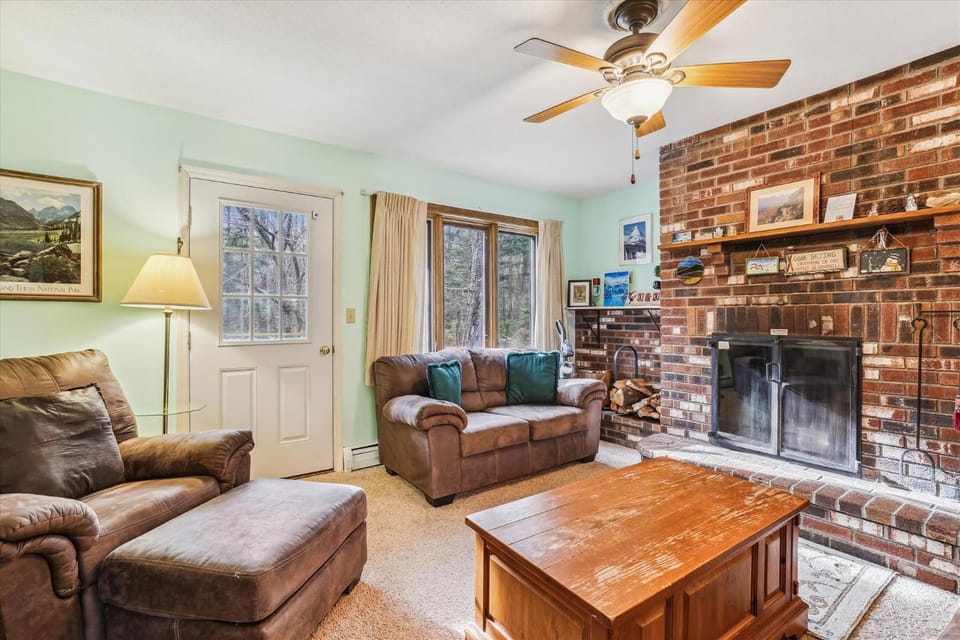 Living room, Seating area, fireplace, flat iron