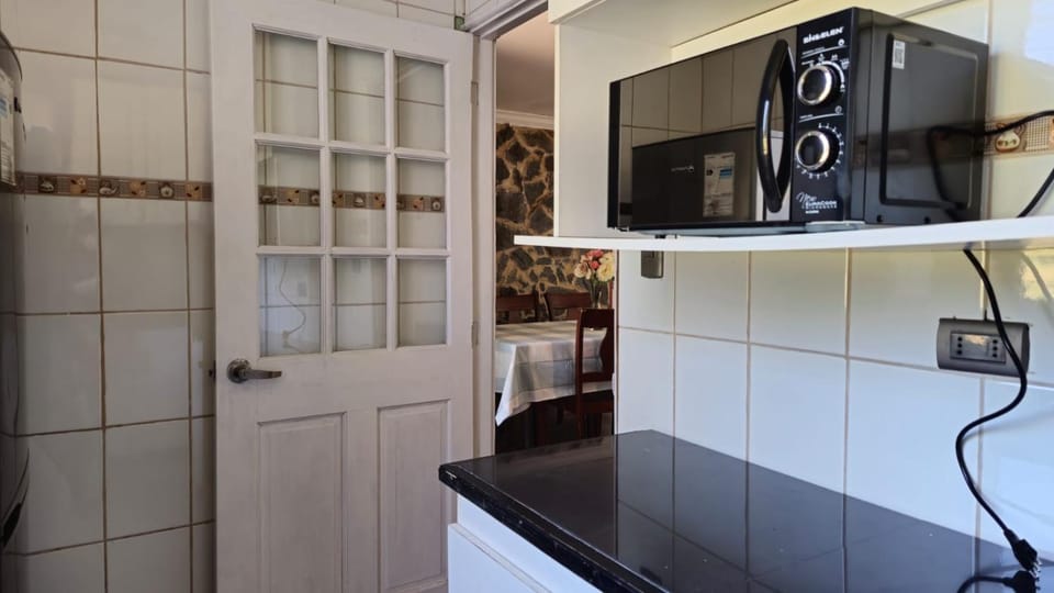 Kitchen or kitchenette, oven
