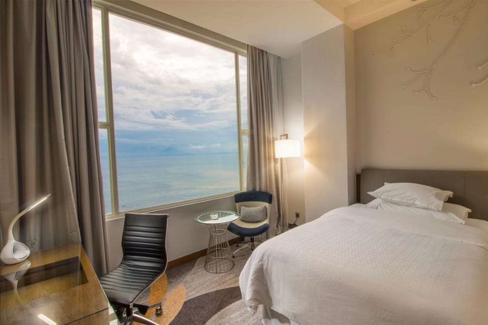 Bed, View (from property/room), Seating area, Bedroom, Mountain view, Pool view, Sea view