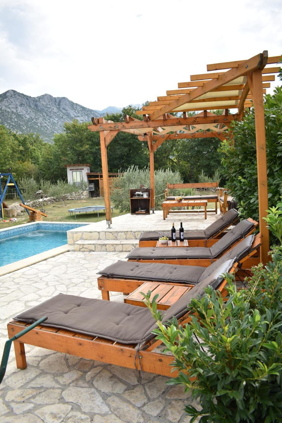Patio, Day, Natural landscape, Mountain view, Pool view, Swimming pool, sunbed