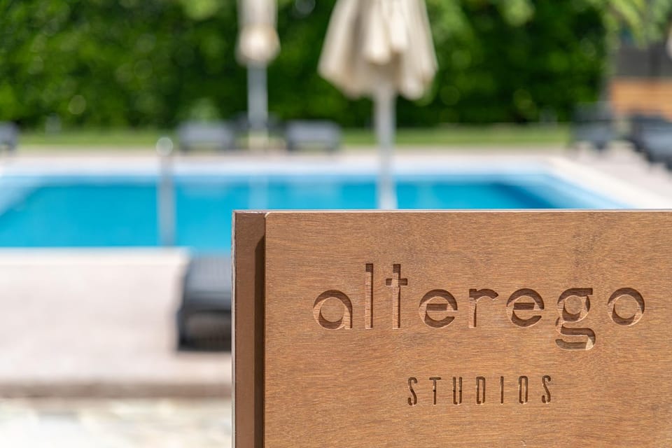 Day, Property logo or sign, Logo/Certificate/Sign, Pool view, Swimming pool