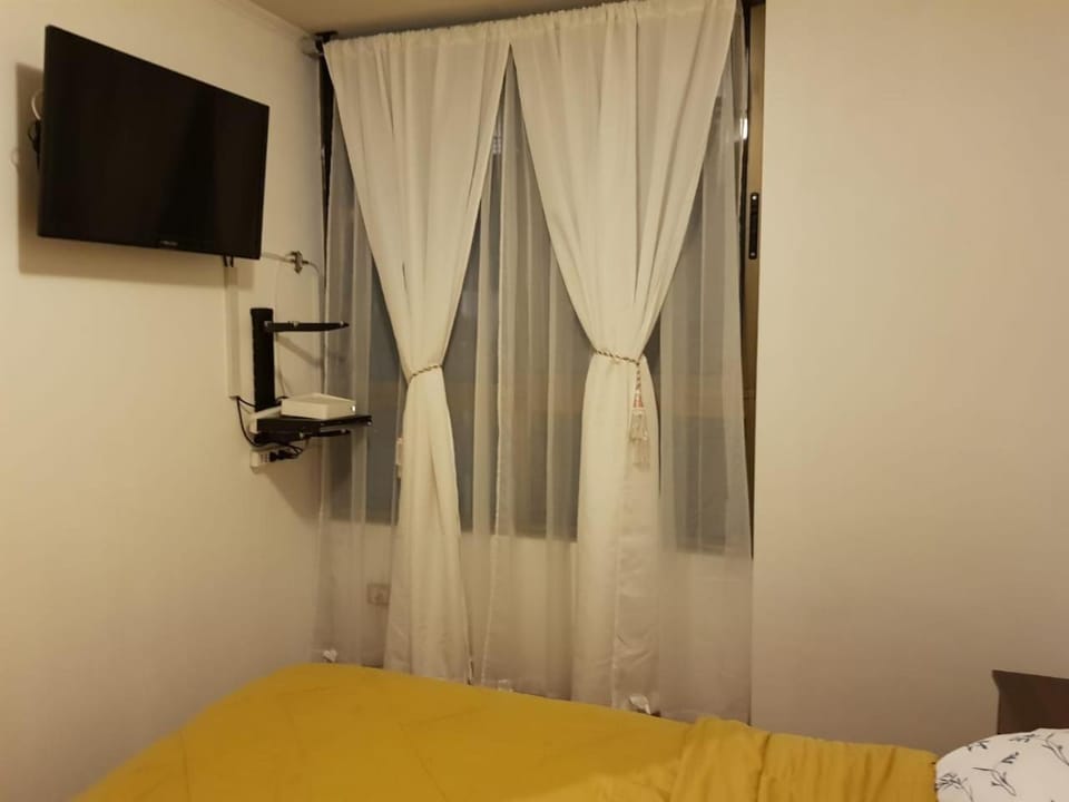 Carmen con Argomedo, PARKING por pagar Apartment in Santiago
