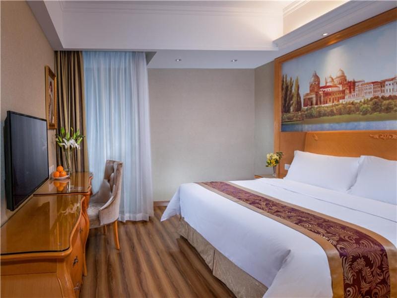 Vienna International Hotel (Shen Zhen Buji Dafen shop) Hotel in Shenzhen