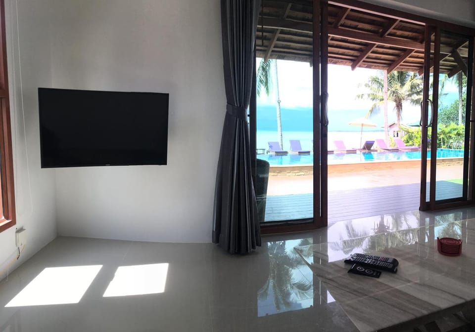 Patio, TV and multimedia, Living room, Seating area, Pool view, Sea view
