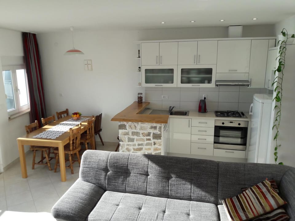 Kitchen or kitchenette, Living room, Dining area, Sea view