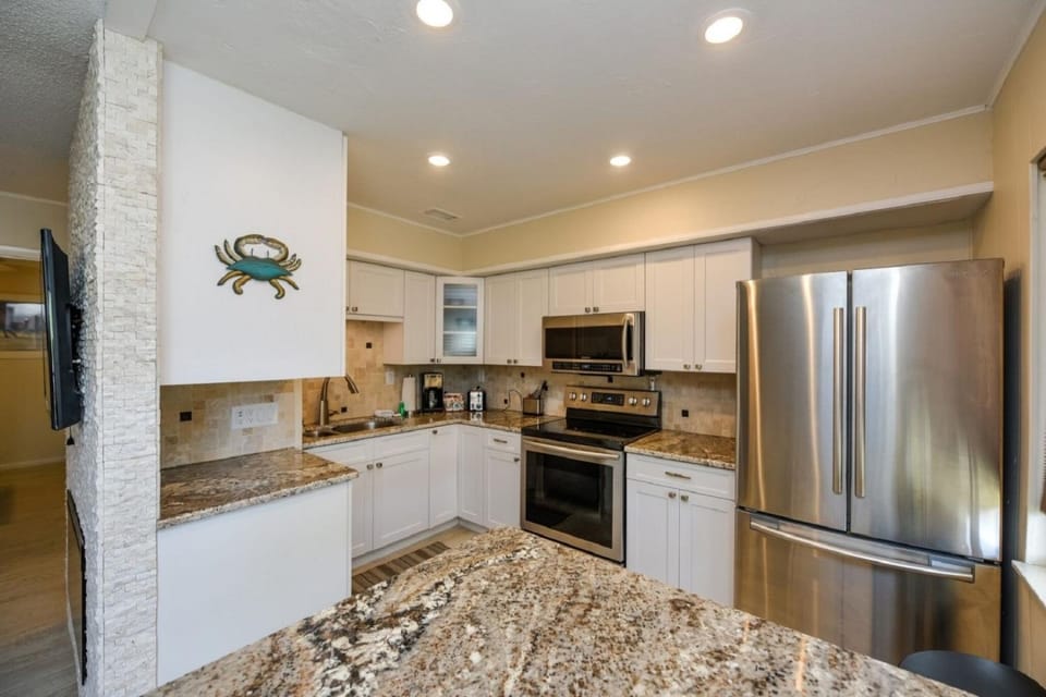 Kitchen or kitchenette, oven, stove, toaster