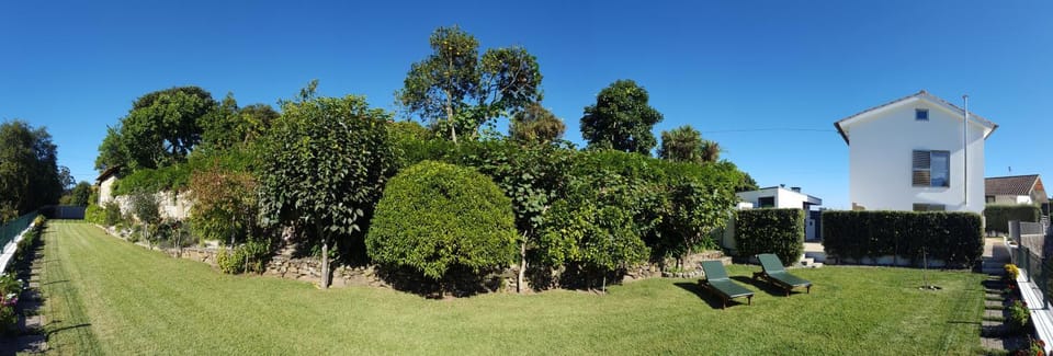 Property building, Facade/entrance, Spring, Off site, Day, Natural landscape, Bird's eye view, Garden, On site, Pets, Pets, Garden view, Family