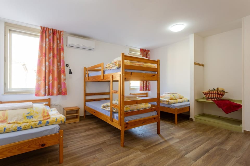 Bed, Photo of the whole room, Bedroom, bunk bed, towels, air conditioner