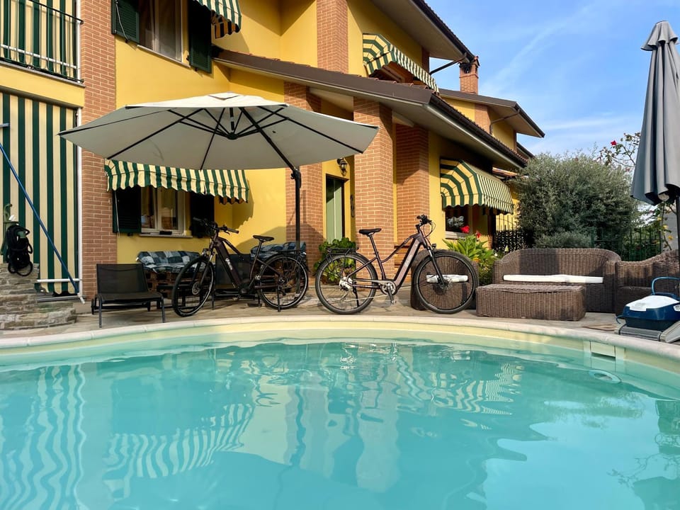 Property building, Cycling, Cycling, Swimming pool, sunbed