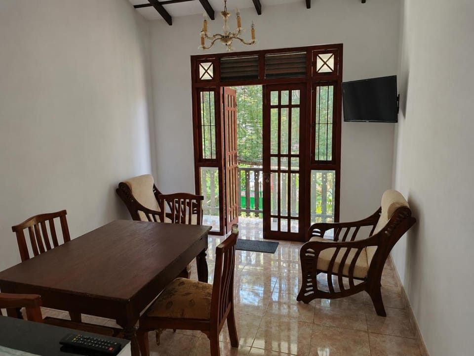 Communal lounge/ TV room, Day, TV and multimedia, View (from property/room), Living room, Seating area, Dining area