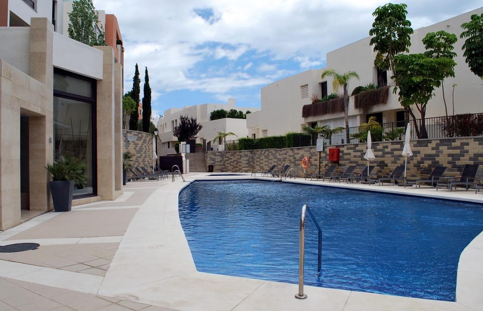 Property building, Pool view, Swimming pool, sunbed