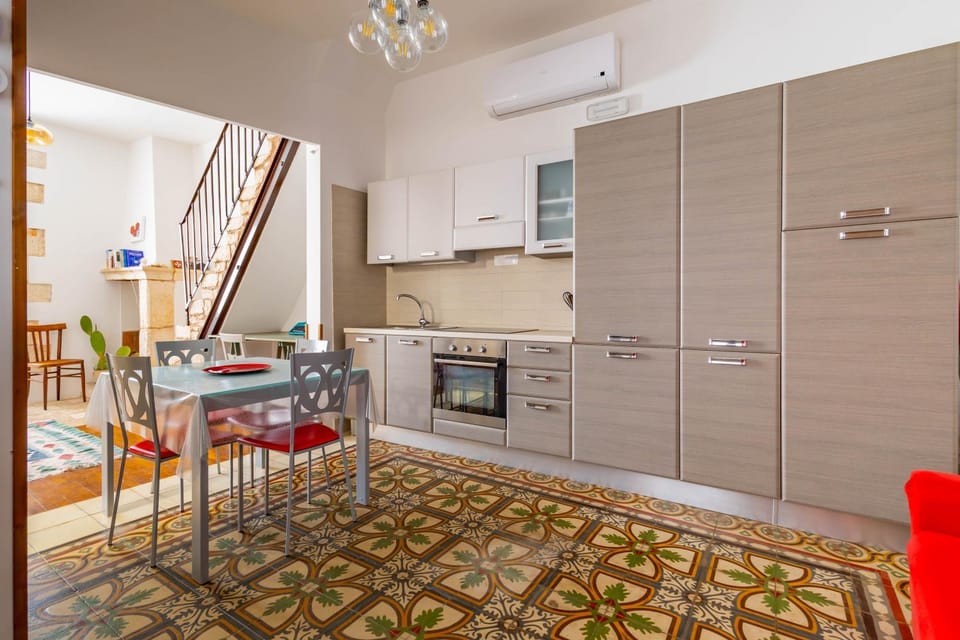 Kitchen or kitchenette, Living room, Seating area, Dining area, oven, stove, air conditioner