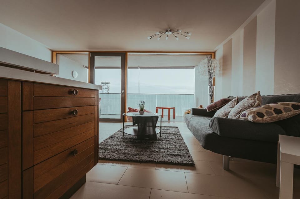 View (from property/room), Living room, Seating area, Lake view