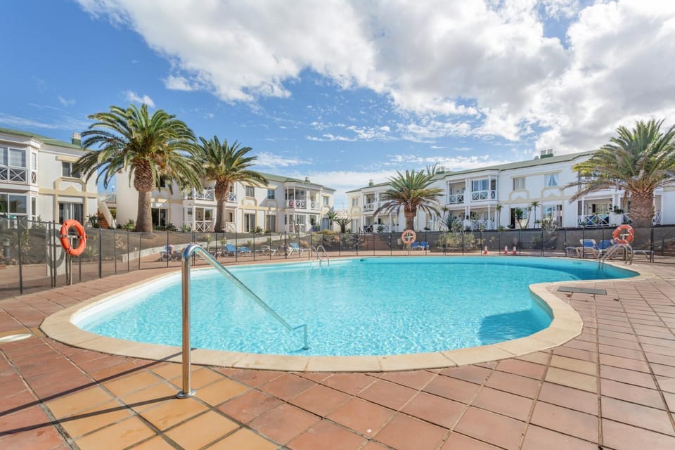 Property building, Living room, Swimming pool