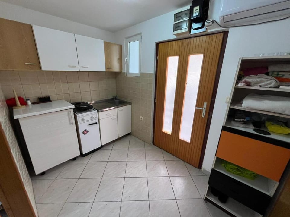 Kitchen or kitchenette, stove