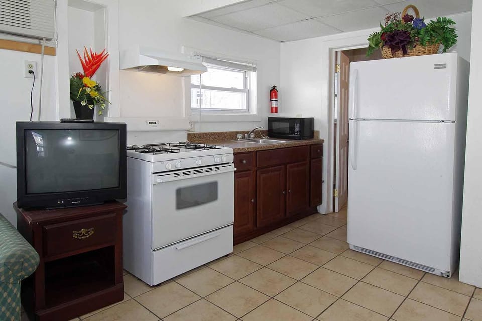 Kitchen or kitchenette, stove