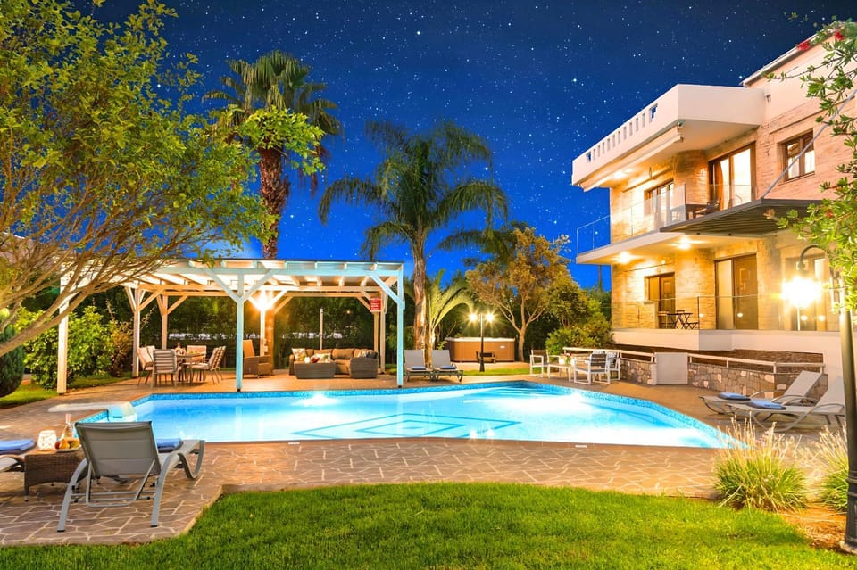 Property building, Patio, Night, Natural landscape, Garden, Garden view, Pool view, Swimming pool, sunbed