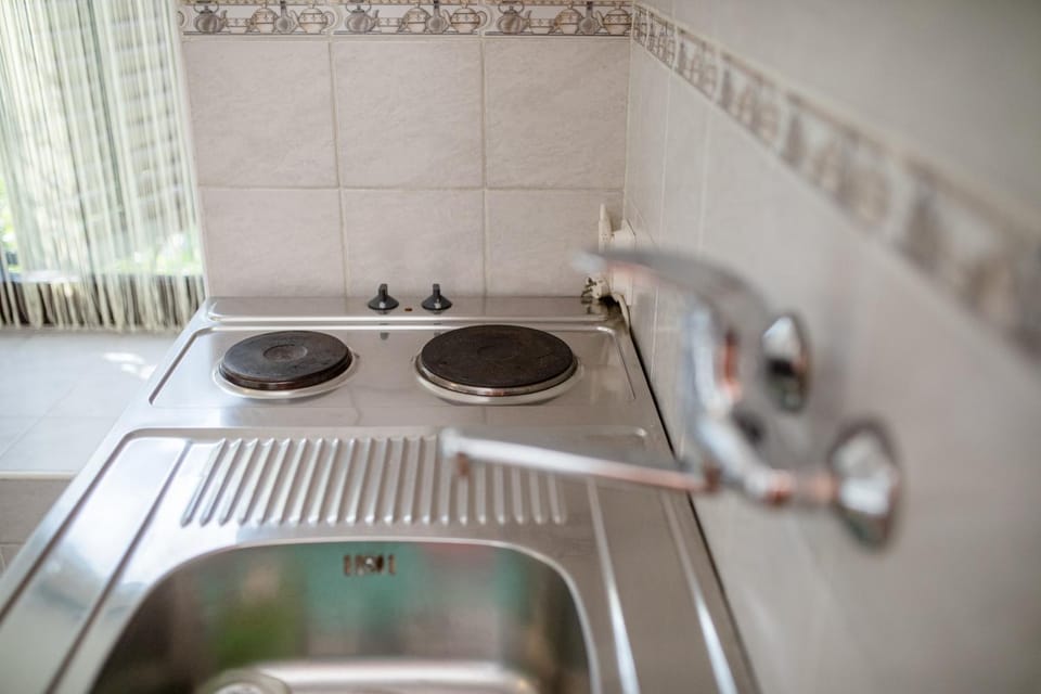 Kitchen or kitchenette, stove