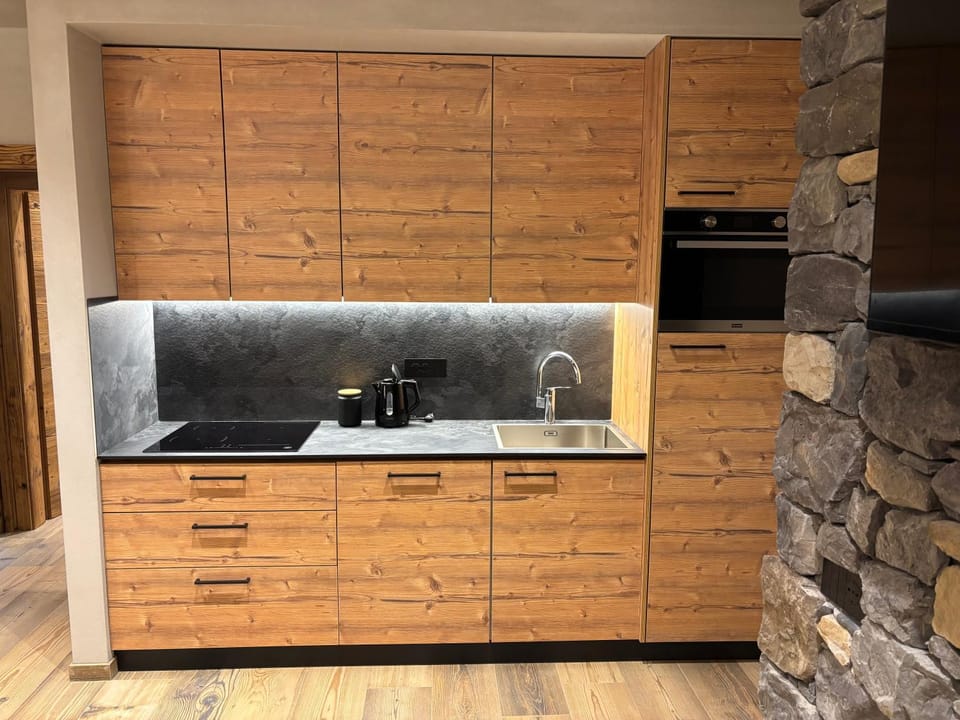 Kitchen or kitchenette, oven, stove