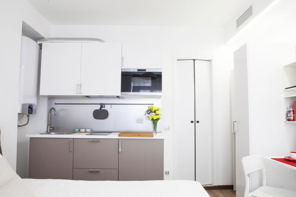 Kitchen or kitchenette, Photo of the whole room, Decorative detail, Seating area, Bedroom