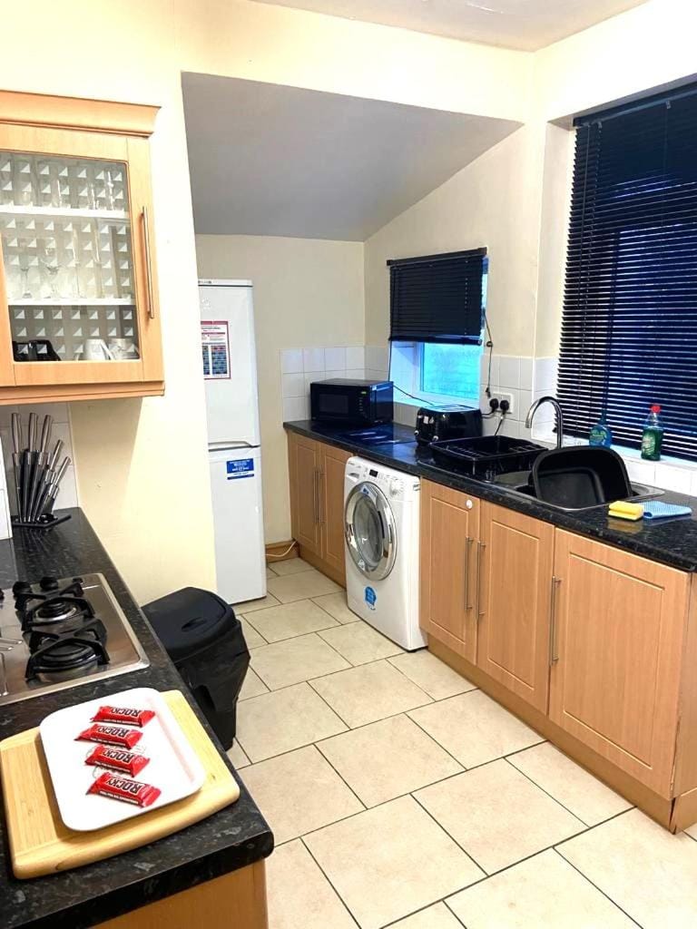 Kitchen or kitchenette, oven, stove