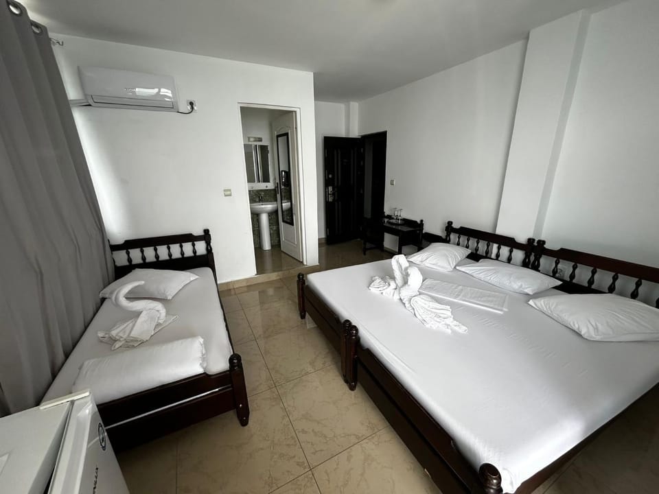 Bed, Bathroom, Photo of the whole room, Bedroom, towels, air conditioner