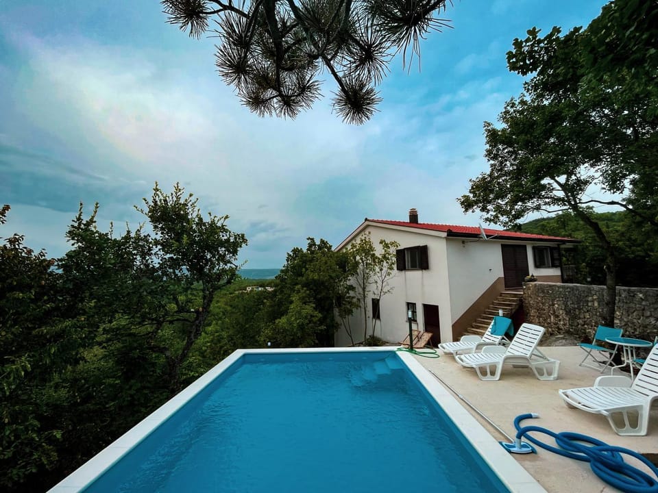 Property building, Patio, Pool view, Swimming pool, sunbed