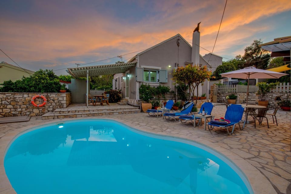 Property building, Natural landscape, Swimming pool, Sunset, sunbed