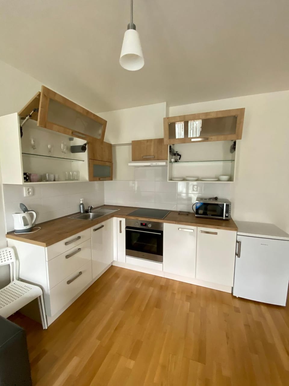 Kitchen or kitchenette, microwave, oven