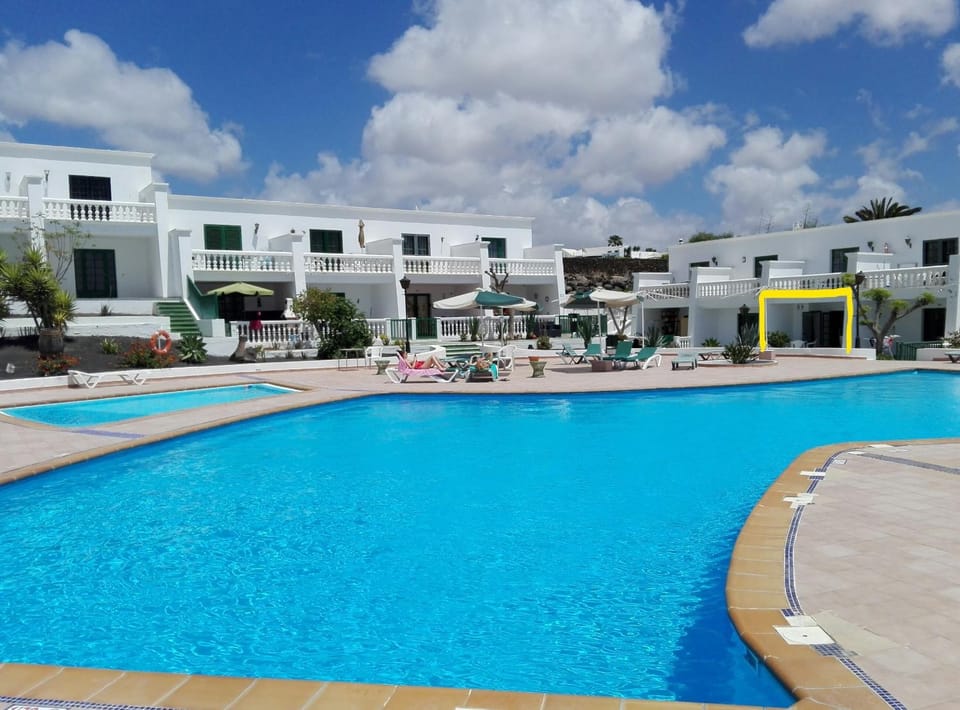 Property building, Facade/entrance, Balcony/Terrace, Pool view