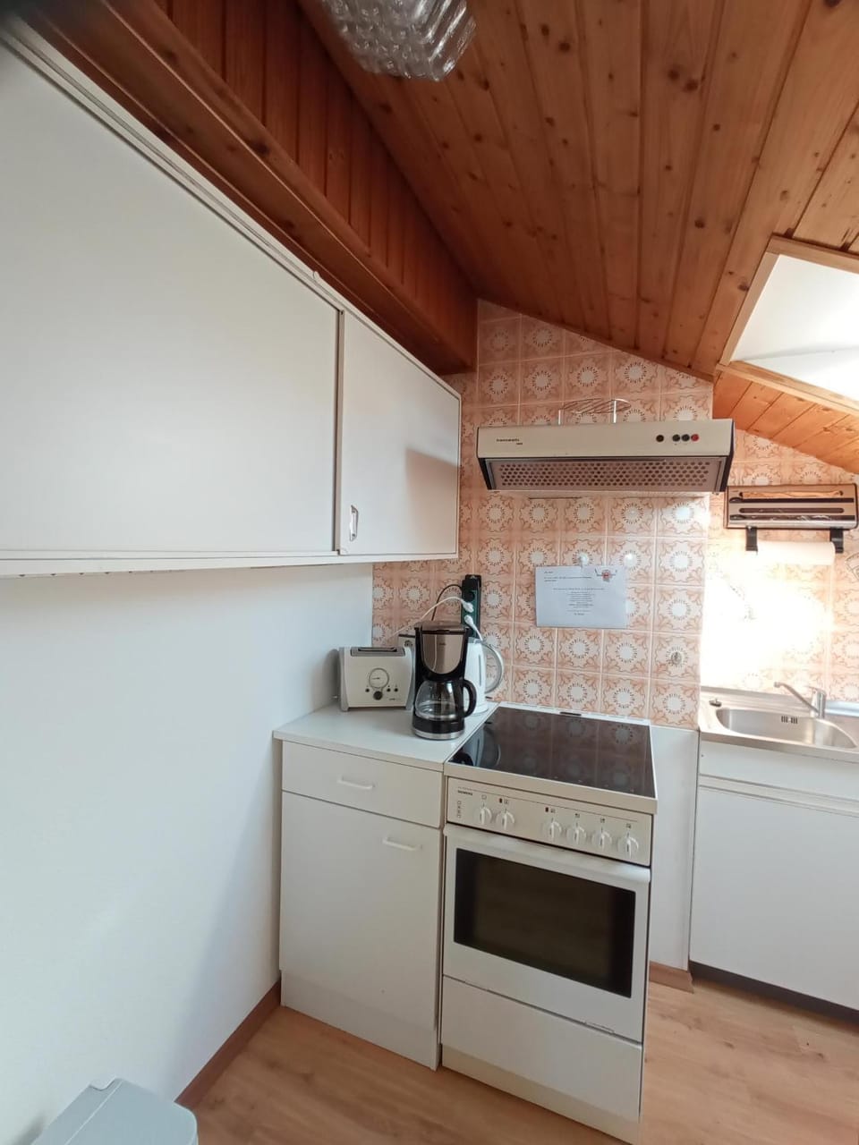 Kitchen or kitchenette, oven, toaster