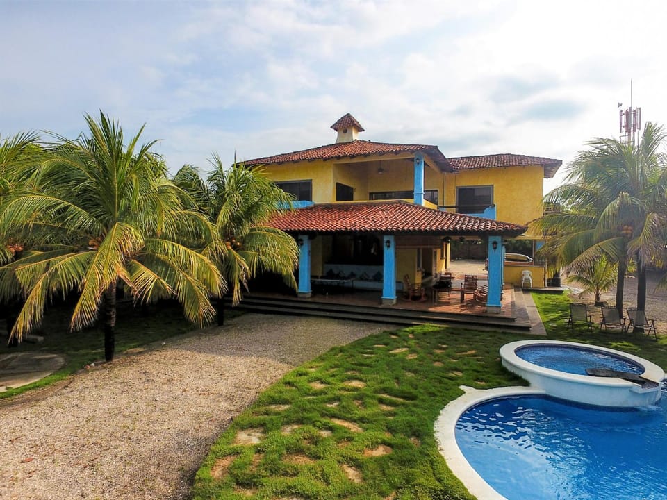Facade/entrance, Garden, Balcony/Terrace, Sea view, Swimming pool