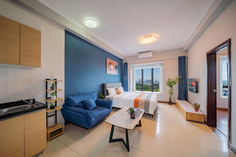 Bed, TV and multimedia, Kitchen or kitchenette, Living room, Photo of the whole room, Seating area, Bedroom, air conditioner