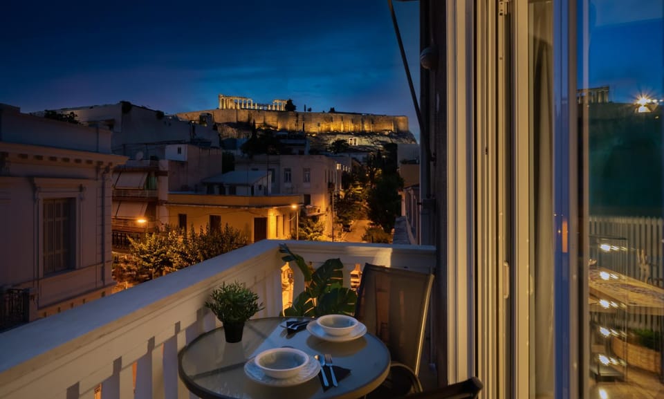 Property building, Patio, Night, View (from property/room), Balcony/Terrace, Dining area, City view