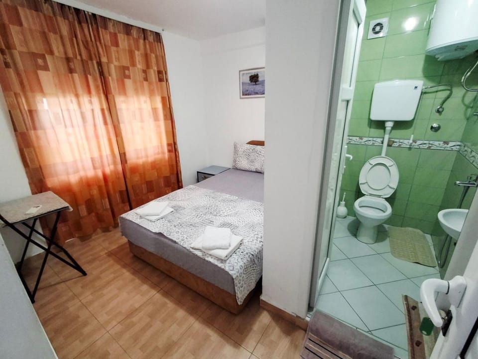 Shower, Bed, Bathroom, Photo of the whole room, Bedroom, towels, air conditioner
