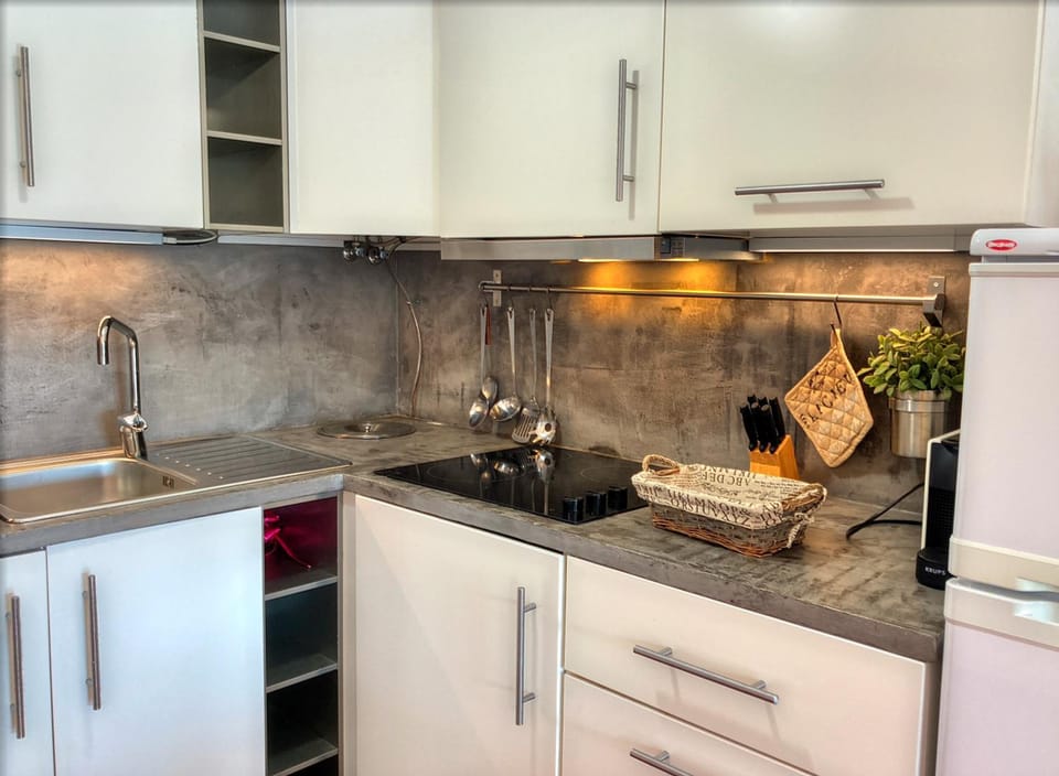 Kitchen or kitchenette, stove