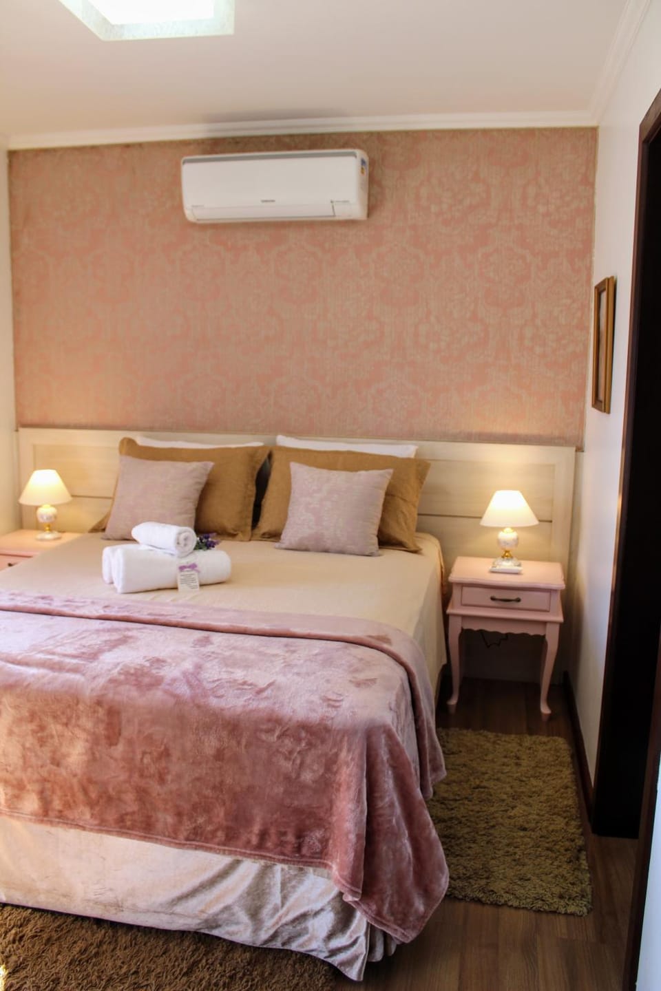 Bed, Photo of the whole room, Decorative detail, Bedroom, towels, air conditioner