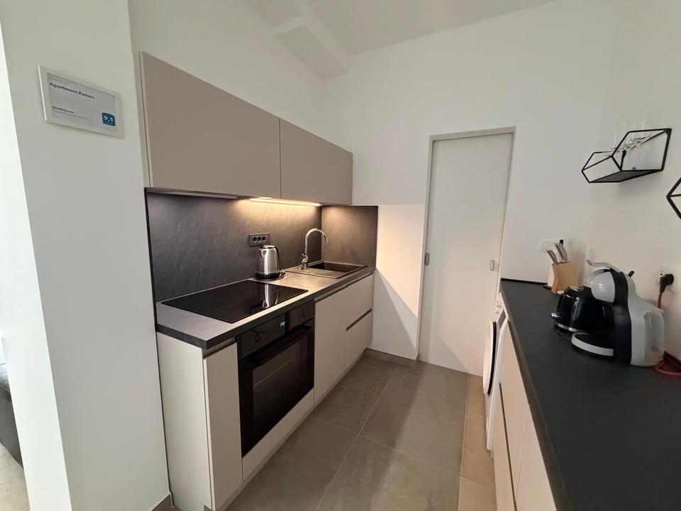Kitchen or kitchenette, oven, stove