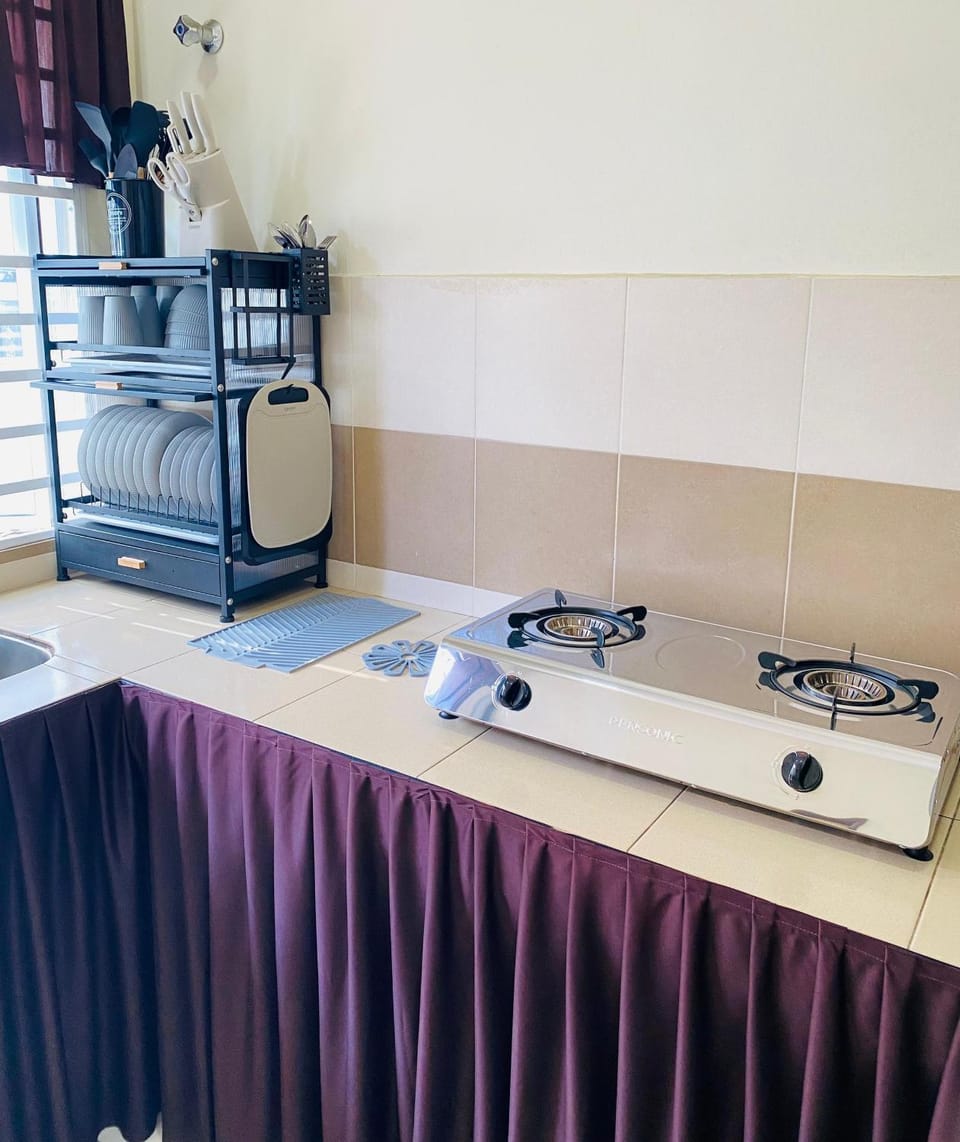 Kitchen or kitchenette, stove