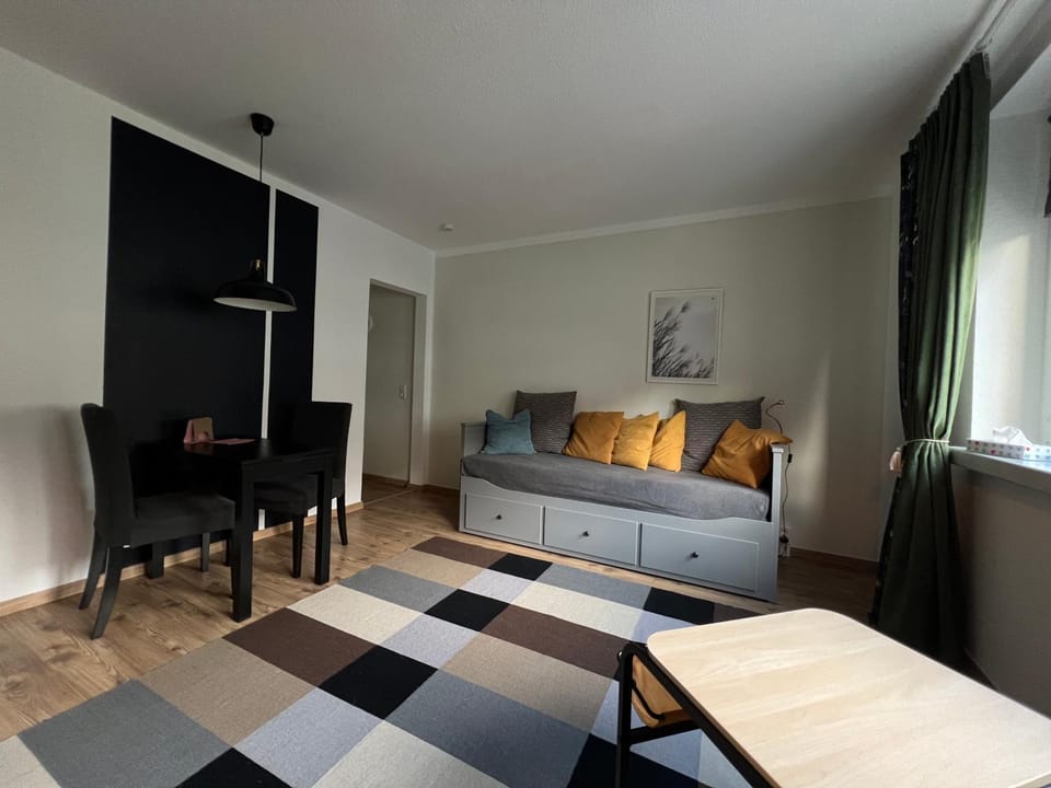 Bed, Living room, Seating area, Bedroom