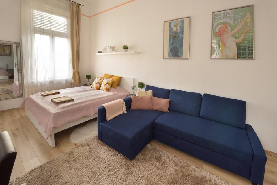 Bed, Living room, Seating area, Bedroom