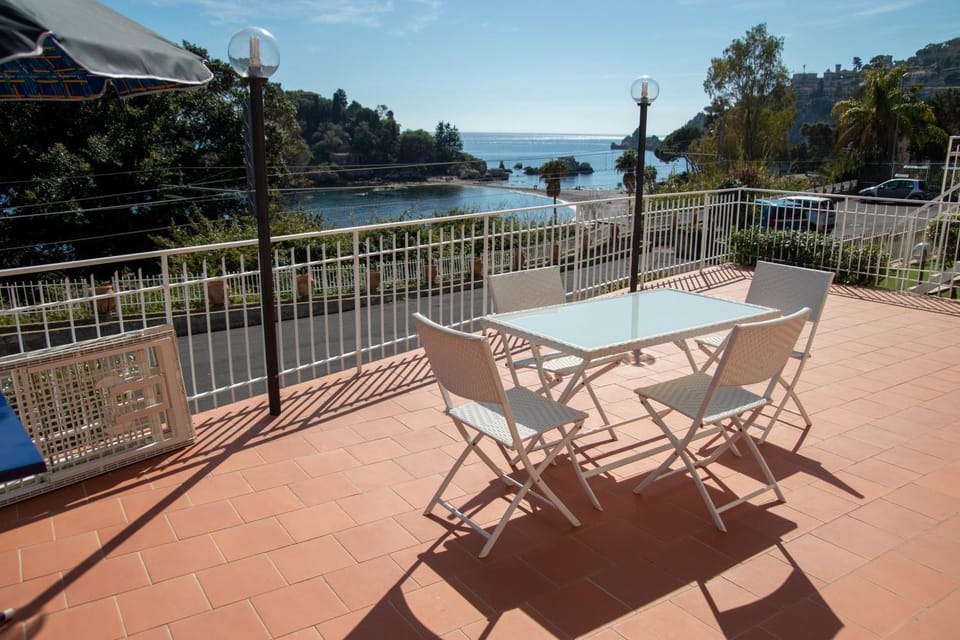Property building, Patio, Day, Natural landscape, View (from property/room), Balcony/Terrace, Living room, Seating area, Dining area, Beach, Lake view, Landmark view, River view, Sea view, Sea view