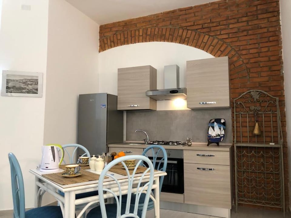 Kitchen or kitchenette, oven