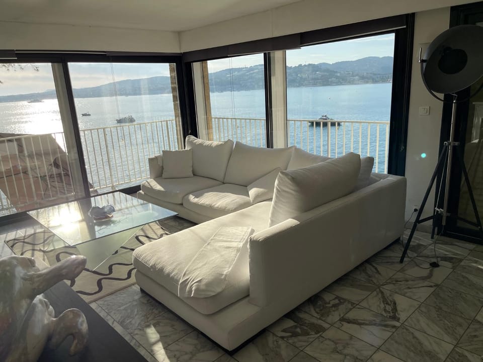 Natural landscape, View (from property/room), Living room, Seating area, Sea view