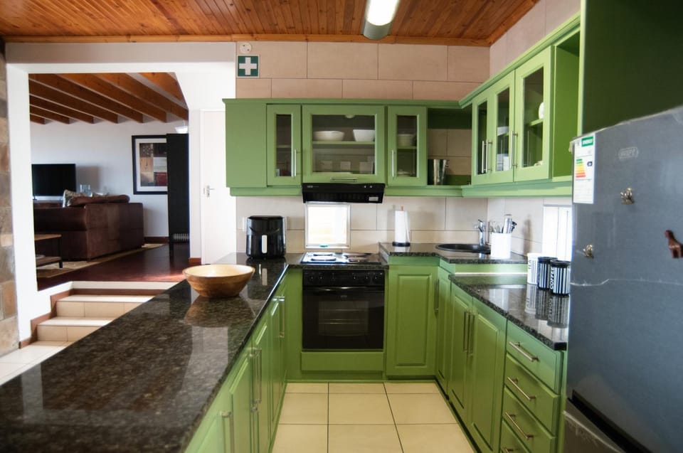 Kitchen or kitchenette, oven, stove, toaster