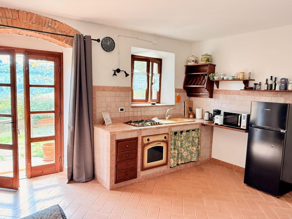 Kitchen or kitchenette, stove, kitchen