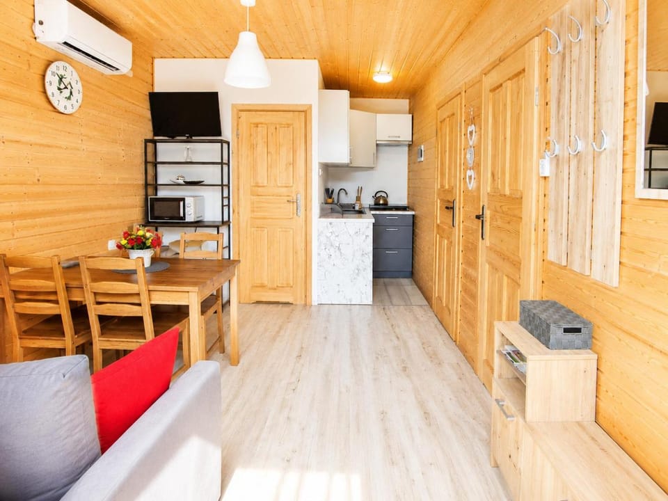 Kitchen or kitchenette, Living room, Seating area, Dining area, oven, stove, air conditioner