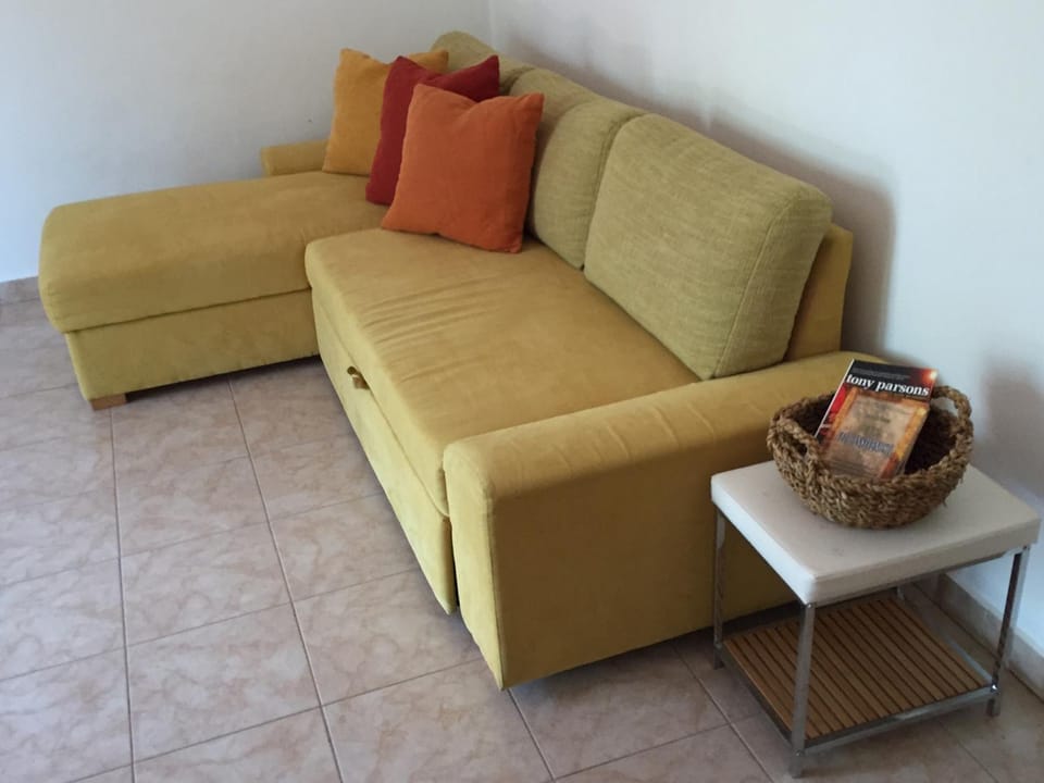 Bed, Living room, Seating area
