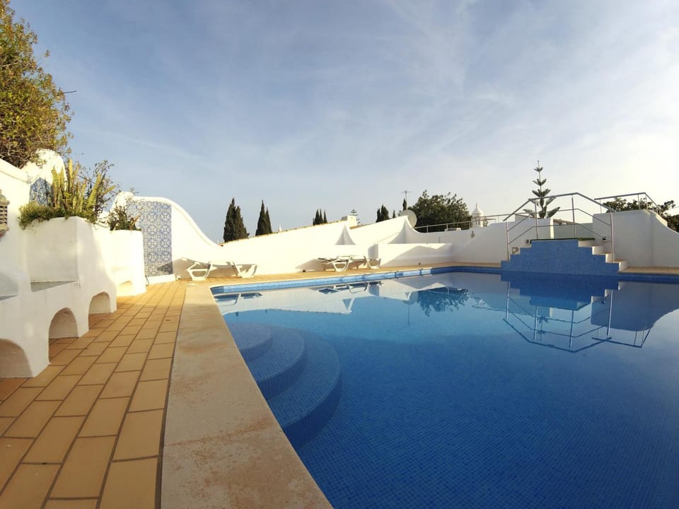 Seating area, Area and facilities, Area and facilities, Swimming pool, Parking