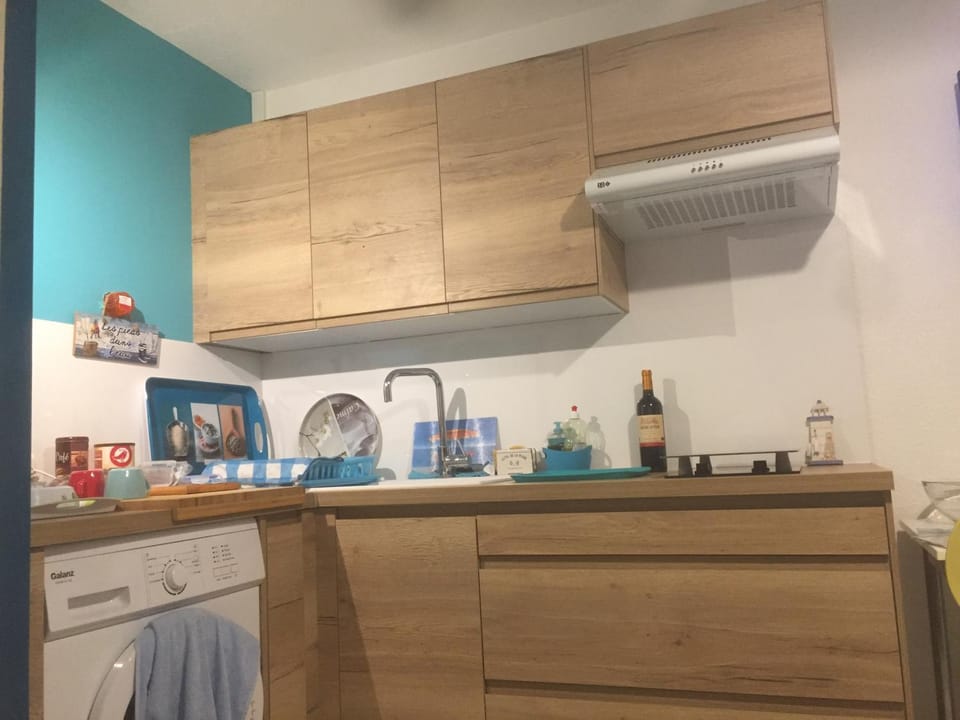 Kitchen or kitchenette, stove